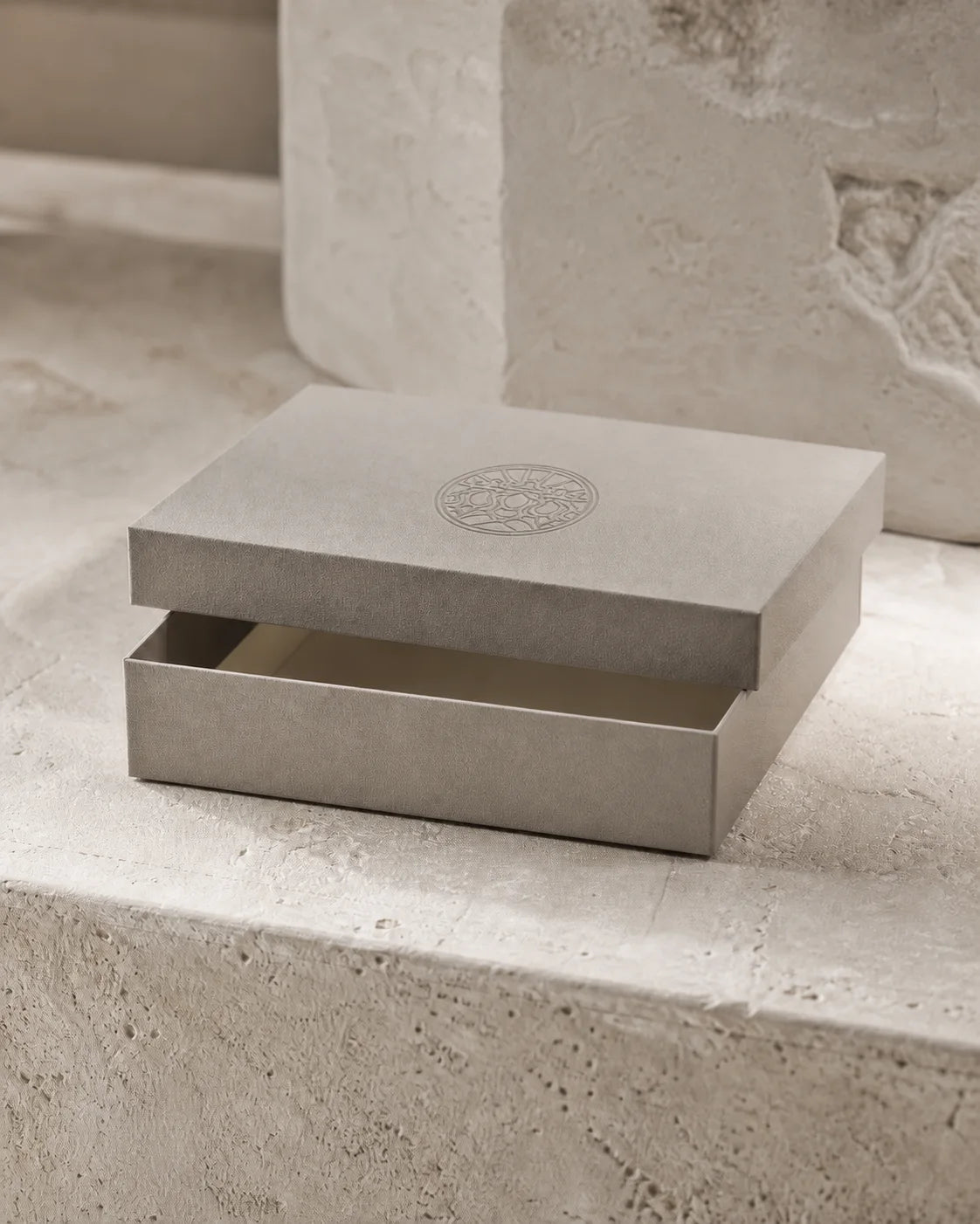 Warm stone-grey pressed-paper keepsake box with fitted lid